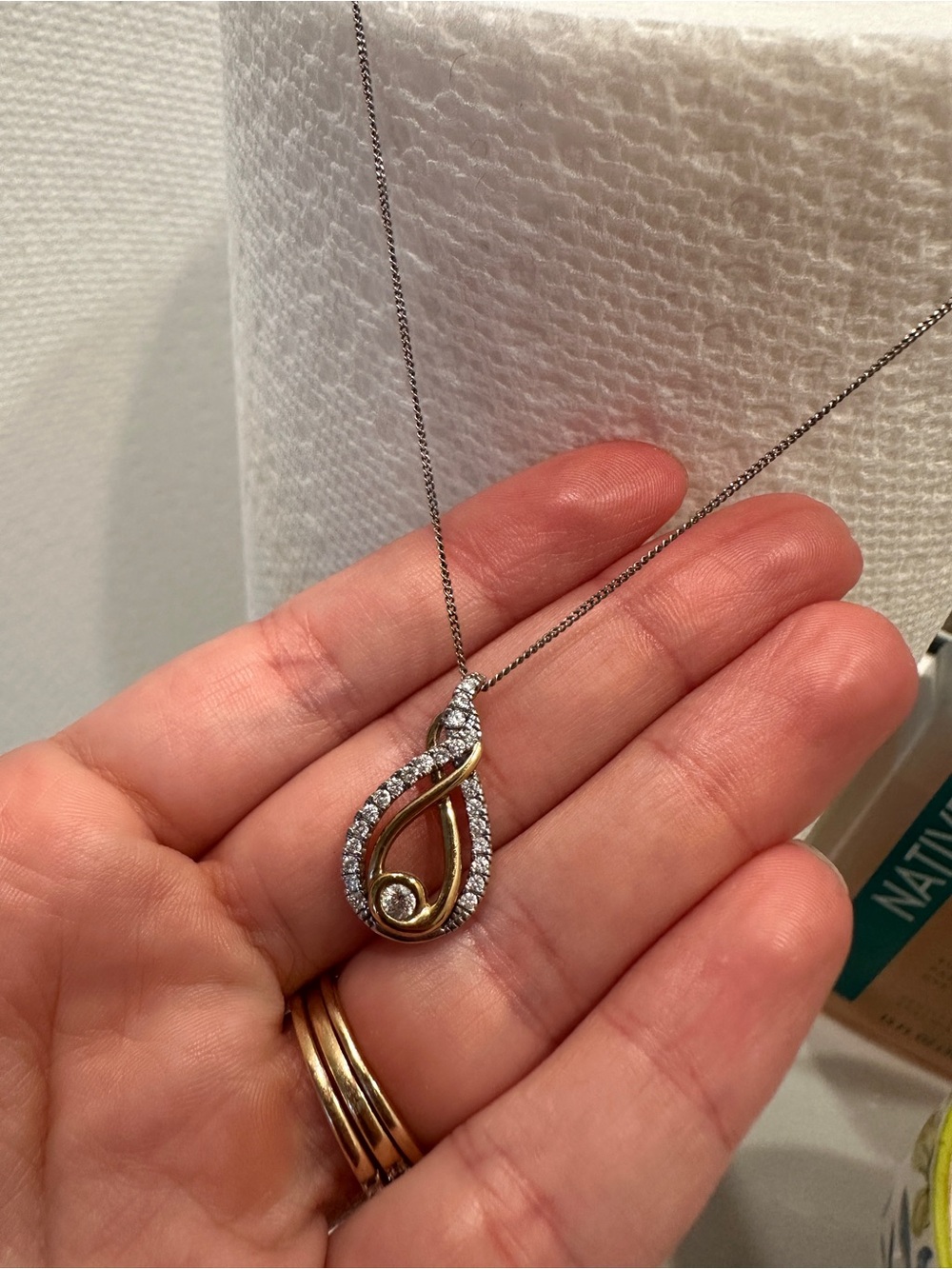 Interwoven diamond necklace